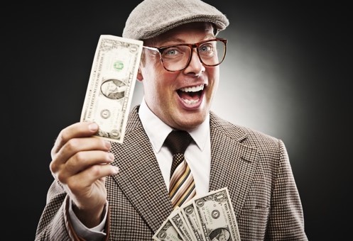 man_holding_cash_000017642070_0